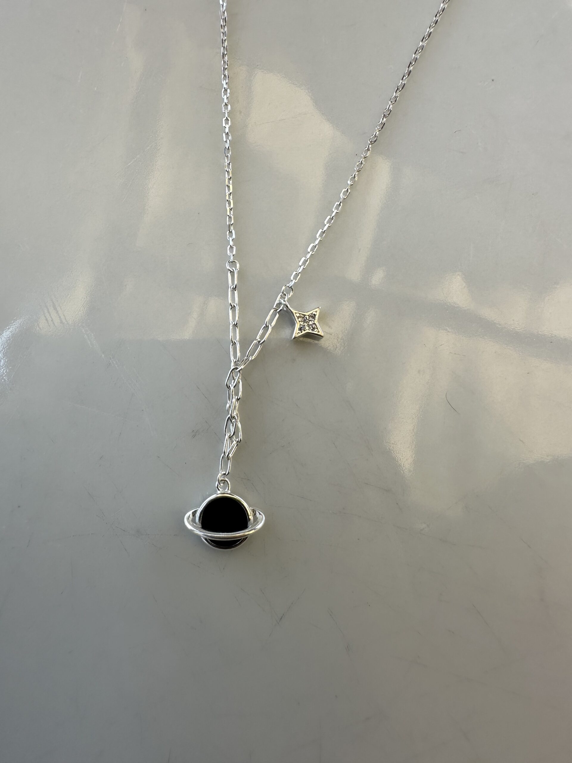 collar de plata saturno
